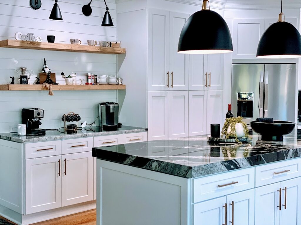 Modern Kitchen with White Cabinets, Granite Countertops & Pastel Backsplash