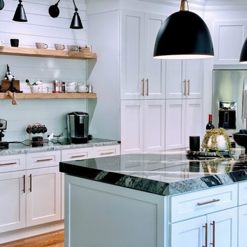 Modern Kitchen with White Cabinets, Granite Countertops & Pastel Backsplash