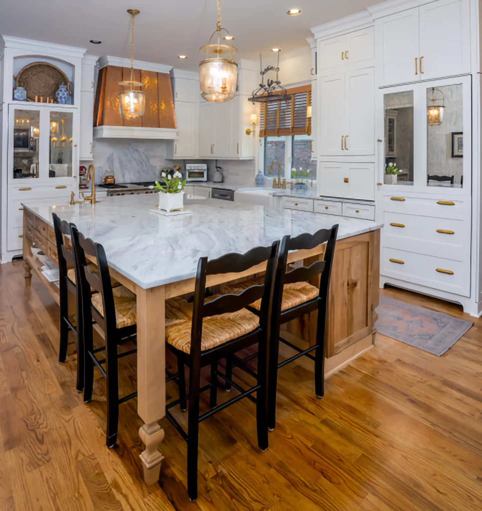 "Luxury Kitchen with White Cabinets, Granite Island & Gold Accents "