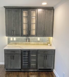 "Modern Home Bar with Dark Cabinets, Frosted Glass & Green Tile Backsplash "