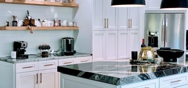 Modern Kitchen with White Cabinets, Granite Countertops & Pastel Backsplash