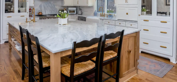 "Luxury Kitchen with White Cabinets, Granite Island & Gold Accents "